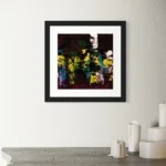 Vibrant abstract oil work featuring deep reds, blues, and bright yellow strokes in a black frame.