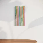 Vertical abstract composition of colorful, vertical streaks in acrylic paint.