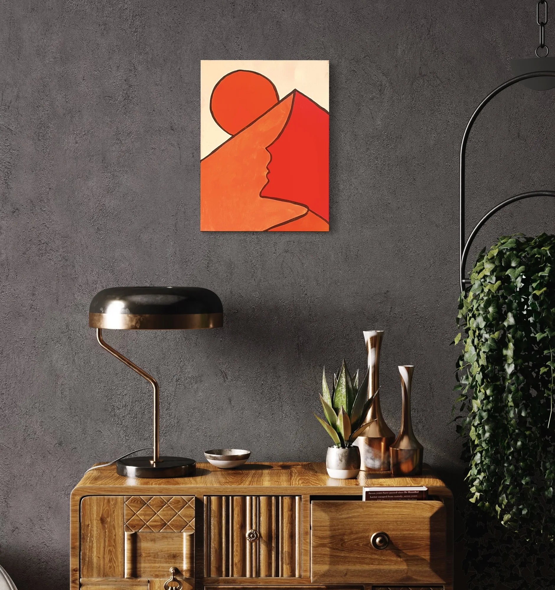 Abstract composition of red and orange shapes on a neutral gray wall.
