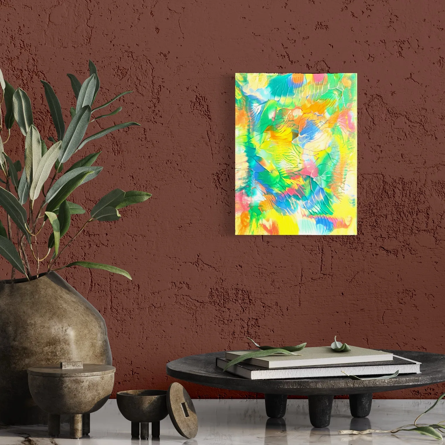 Vibrant abstract acrylic artwork featuring bright yellows, greens, and blues on a solid wall.