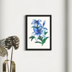 Blue and white lilies in watercolor style, framed artwork on a white wall.