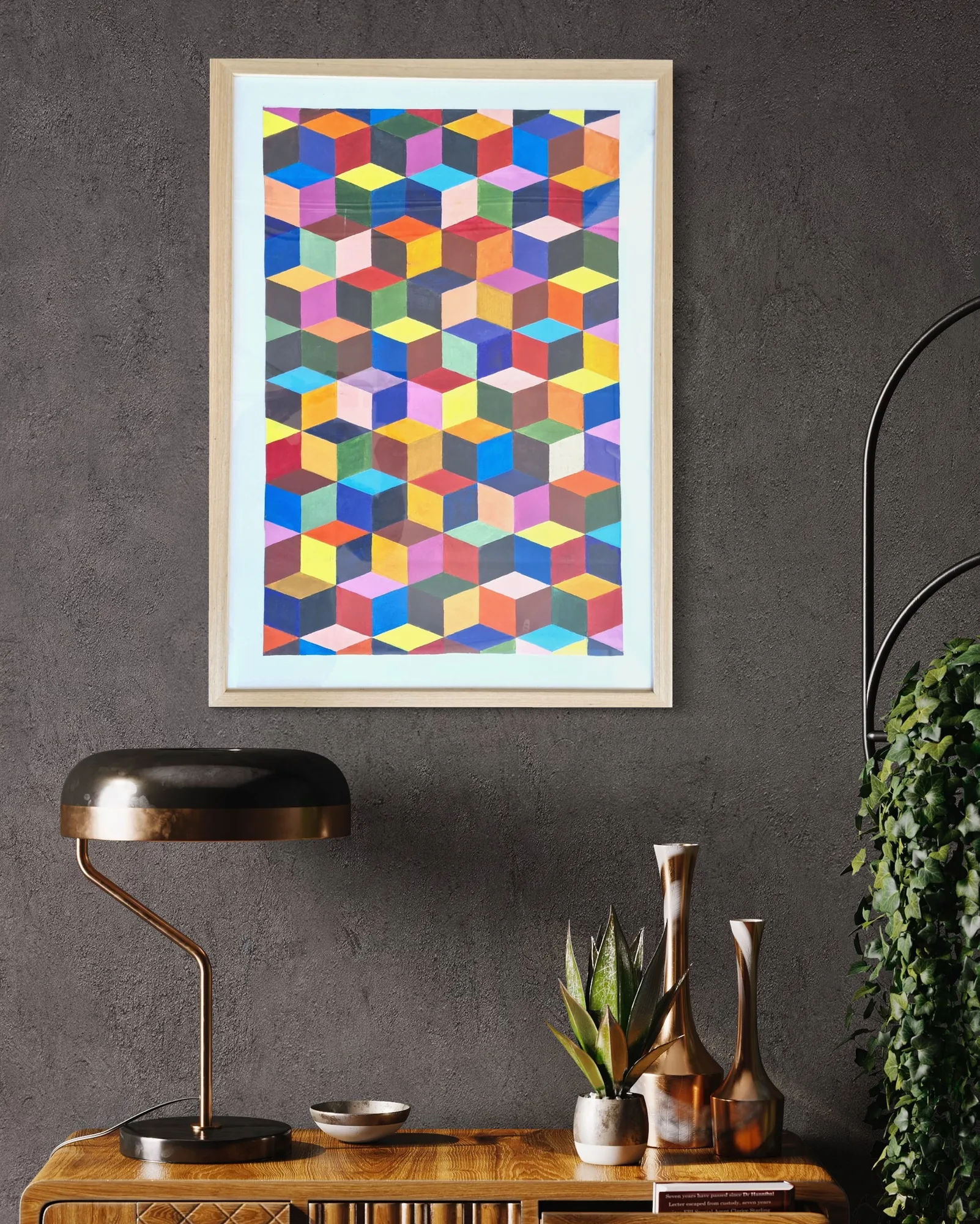 Colorful geometric pattern in acrylic, framed, featuring vibrant squares and triangles.
