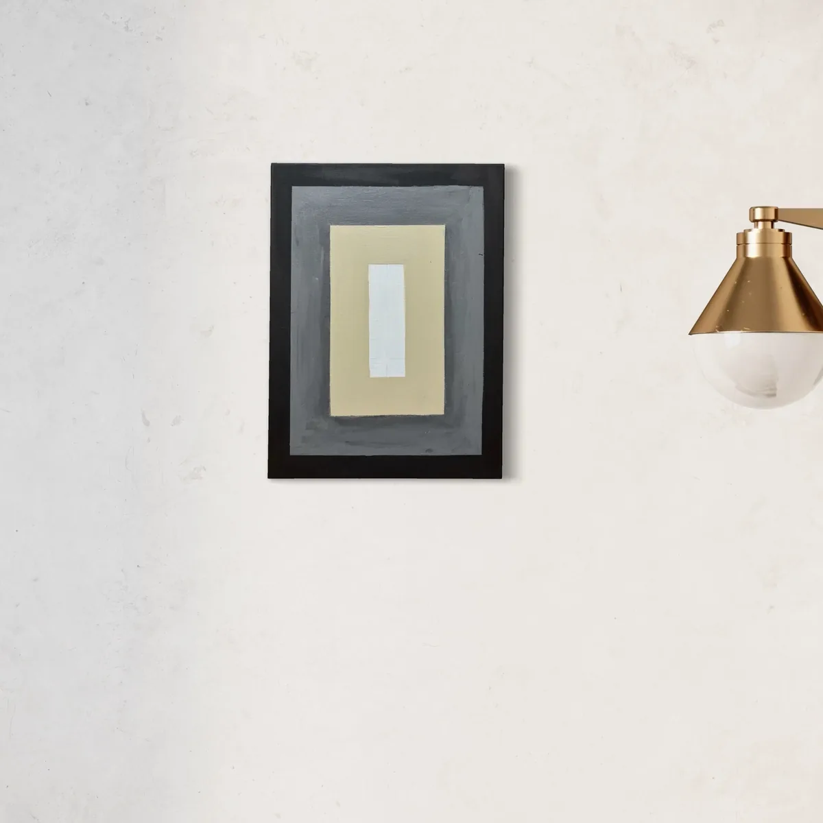 Abstract composition of grey, beige, and white rectangles within a dark frame.